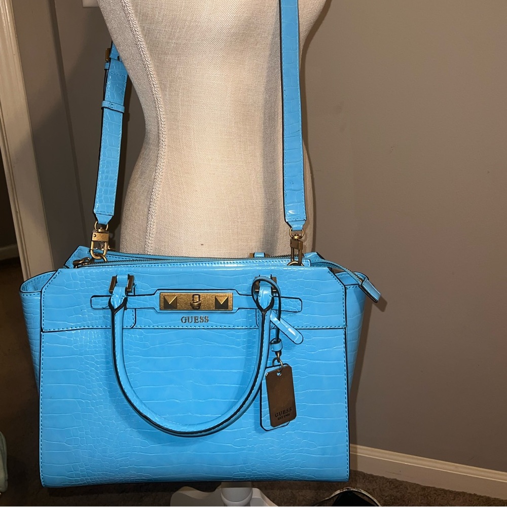 GUESS electric blue crocodile embossed carryall